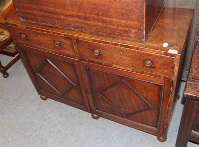 Lot 1398 - A late Regency mahogany sideboard, with two drawers and tow lozenge moulded cupboard doors,...