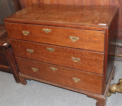 Lot 1400 - ^ A George III oak three drawer straight fronted chest on bracket feet, 105cm wide