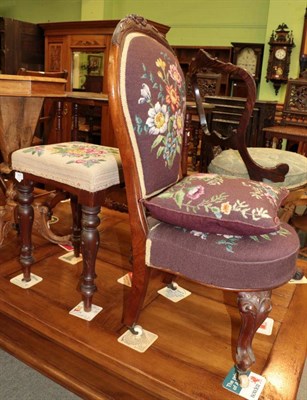 Lot 1407 - A Victorian carved mahogany nursing chair with needlework seat and back; together with a...