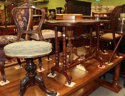 Lot 1408 - ^ A Victorian walnut chess top occasional table; a late Victorian revolving music seat; and an...