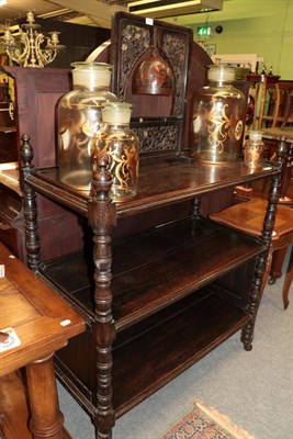 Lot 1409 - ^ A late 19th century oak three-tier dumbwaiter, 110cm wide