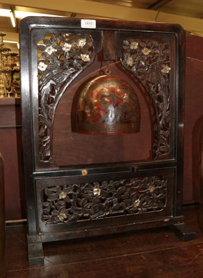 Lot 1410 - ^ A late 19th/early 20th century Chinese table screen/bell, with fret carved panels decorated...