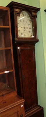 Lot 1431 - A walnut triple weight driven striking longcase clock, arch painted white dial bearing...