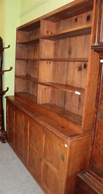 Lot 1432 - A double open bookcase, 194cm wide