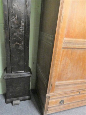Lot 1434 - An Arts & Crafts Limed Oak Wardrobe, designed by Frederick Muntzer, three-door two-sectional...