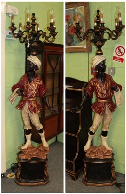 Lot 1443 - A pair of reproduction blackamoor lamps, 200cm high