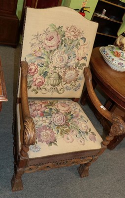 Lot 1446 - A Victorian carved oak tapestry armchair in 17th century style, with acanthus carved arm grips,...