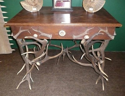 Lot 1292 - A German Antler Mounted Stained Wood Writing or Occasional Table, Carl Pieters, Neustadt, circa...