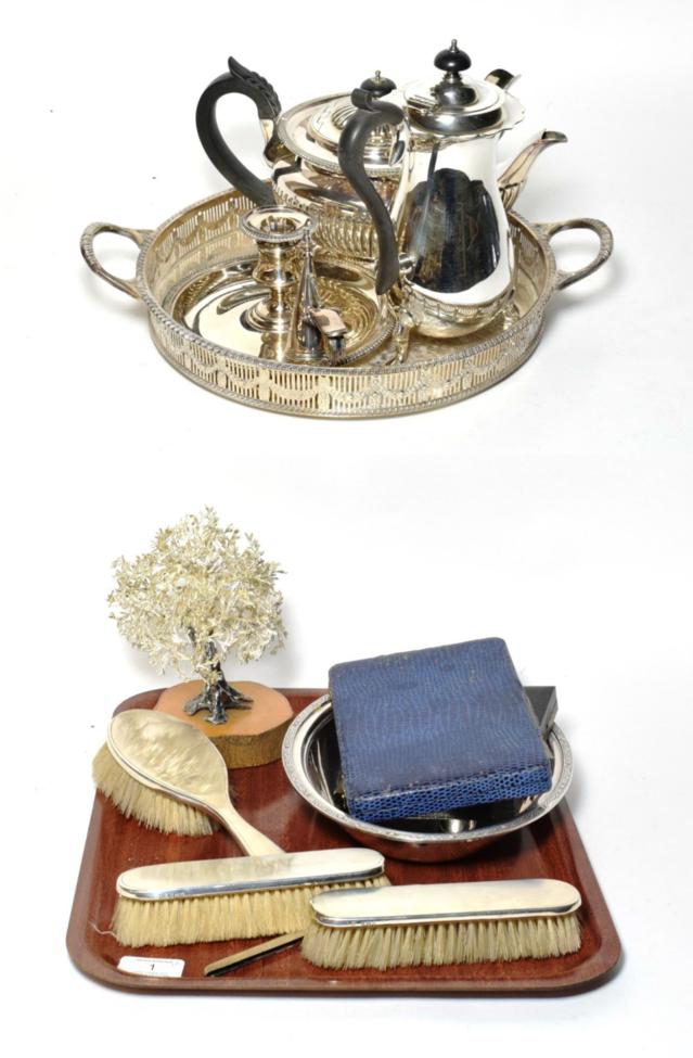 Lot 1 - Circular plated gallery tray; teapot; coffee pot; teaspoons; chamberstick; silver mounted brush...