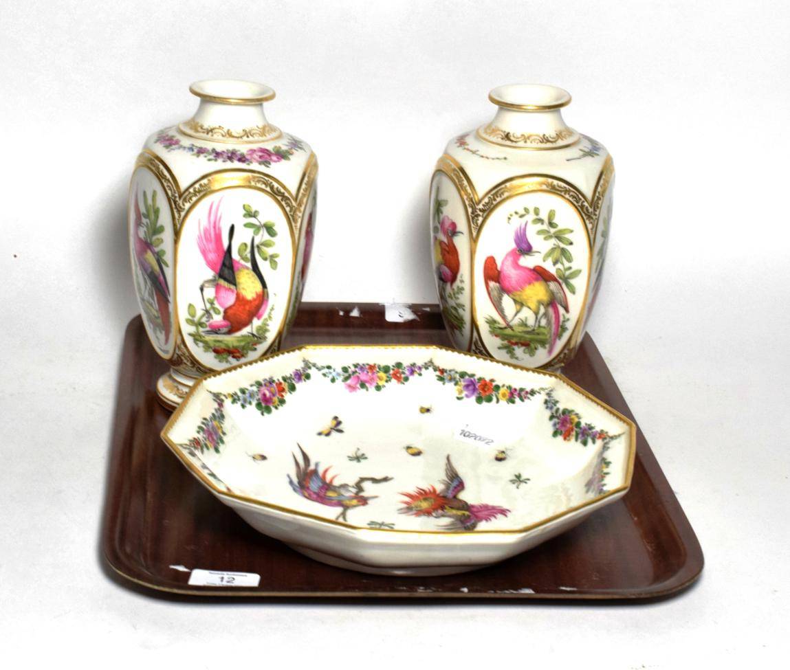 Lot 12 - A pair of Continental 18th century style vases and a similar dish (3)