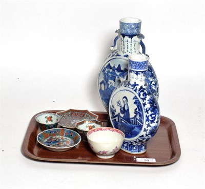 Lot 35 - Two Chinese blue and white porcelain twin handled moon flasks, an 18th century tea bowl, two...