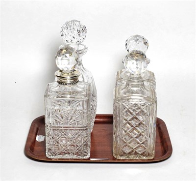 Lot 39 - A silver mounted decanter stamped Aspreys London, a Waterford decanter and a pair of decanters
