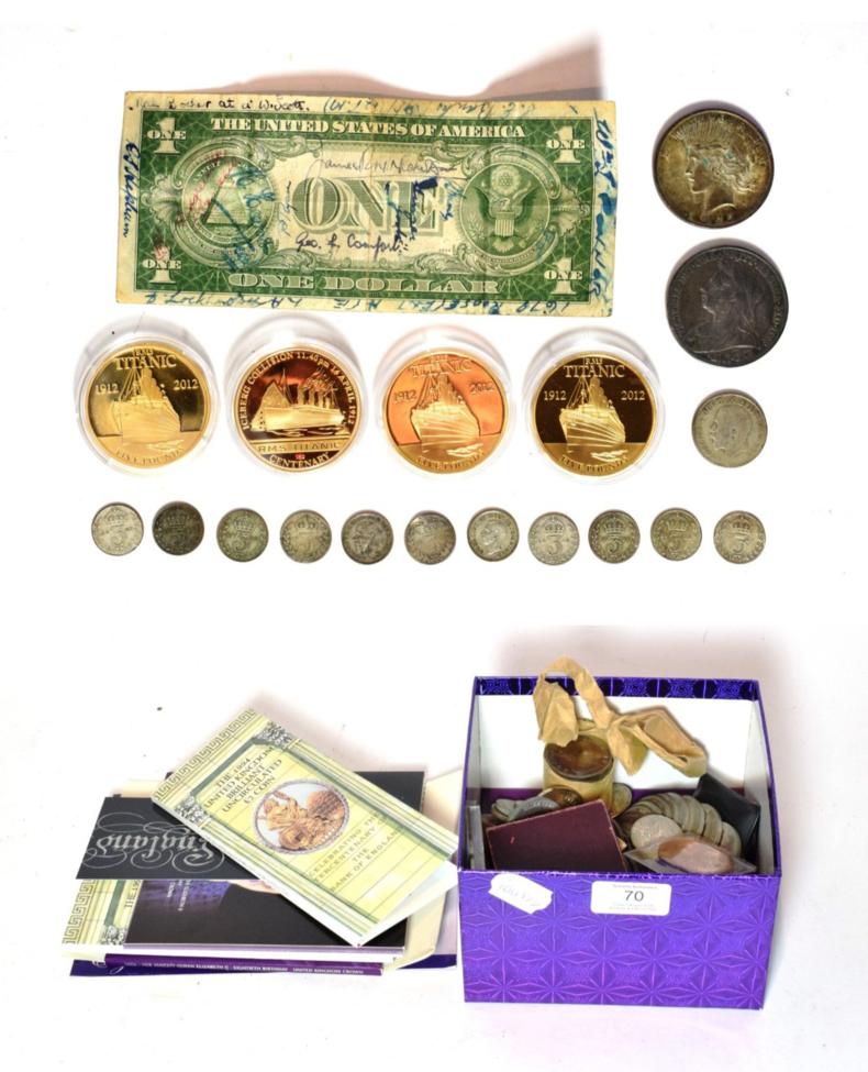 Lot 70 - A small group of coins including a Victorian crown 1900, an American $1 1922, a small group of...