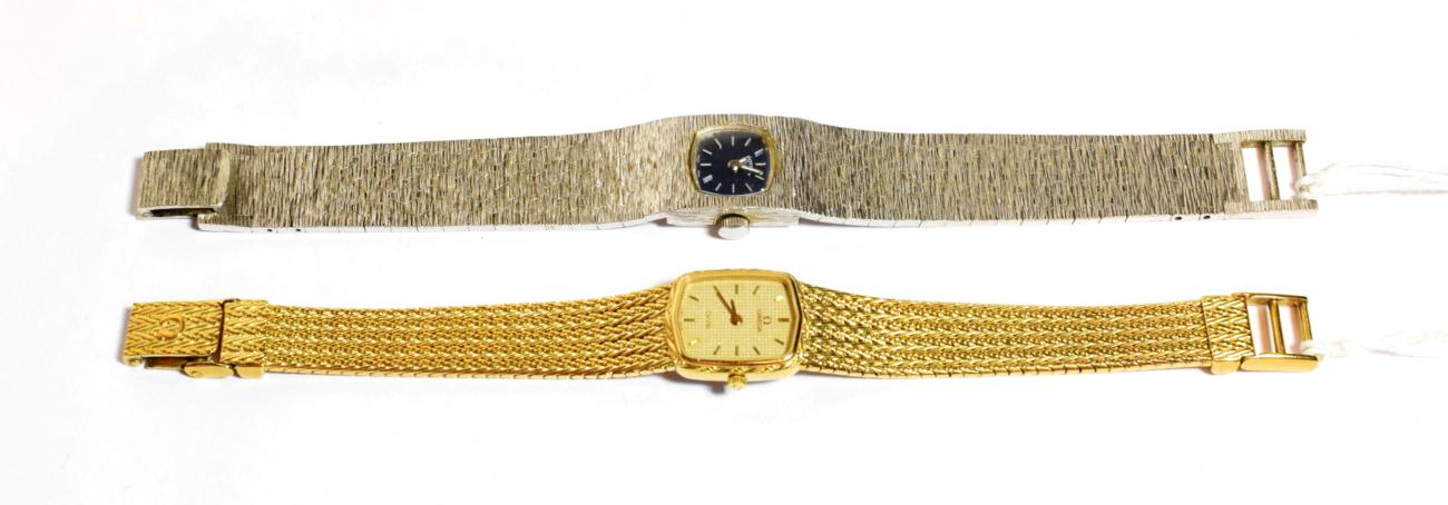 Lot 73 - A lady's gold plated Omega De Ville; with a Rotary bark effect plated wristwatch