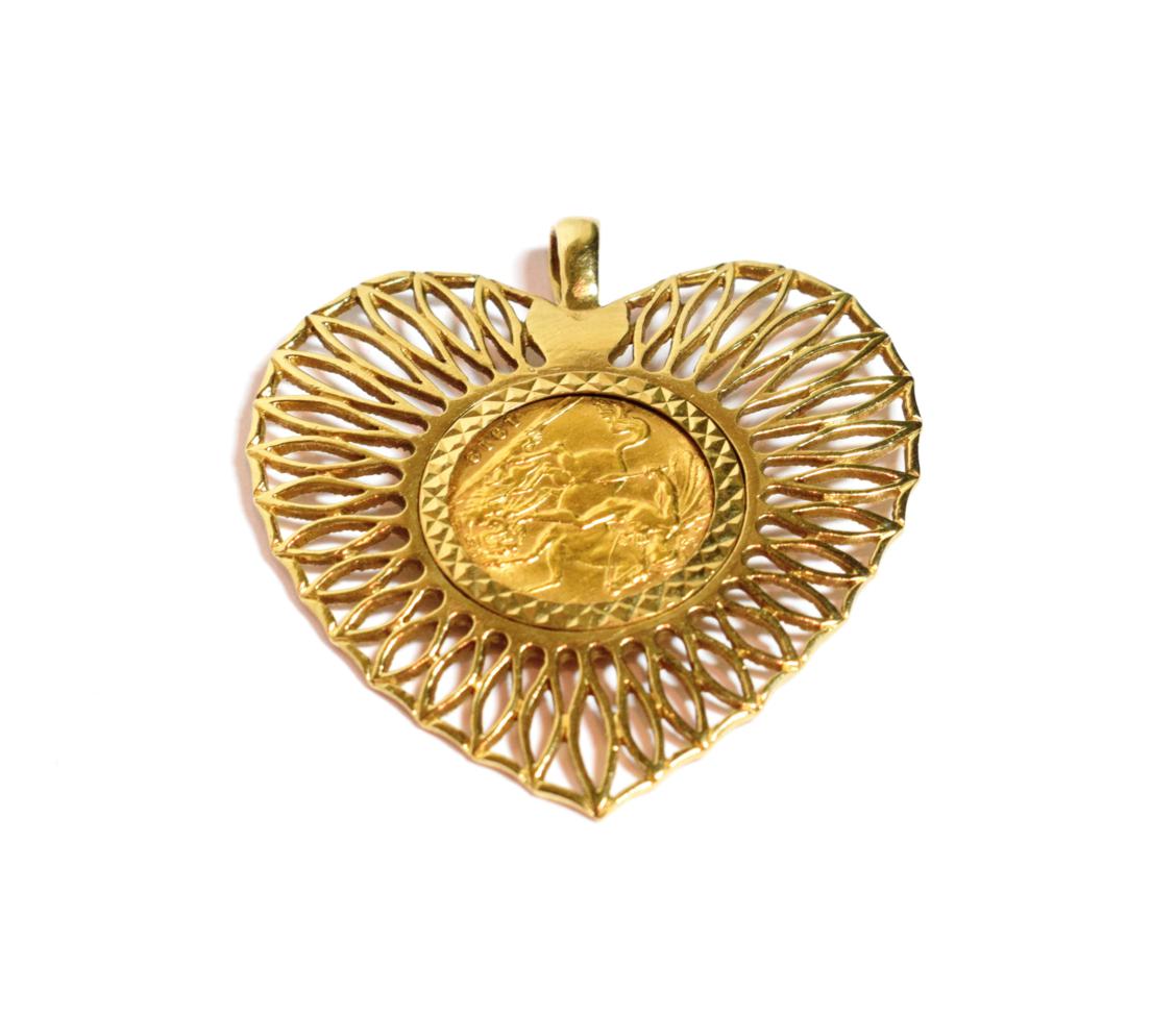Lot 91 - A 1912 half sovereign in a 9 carat gold heart shaped pendant, measures 4.2cm by 4.7cm