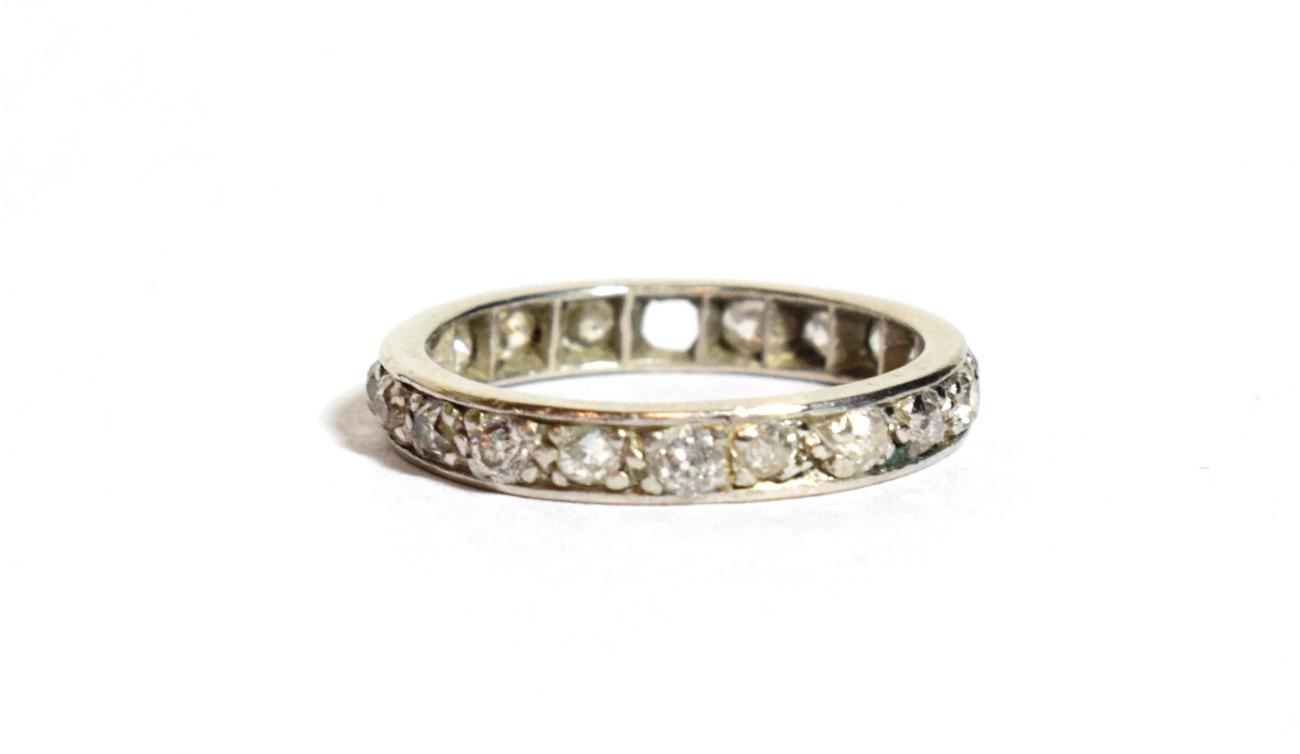 Lot 98 - A diamond eternity ring, one stone deficient, finger size M1/2