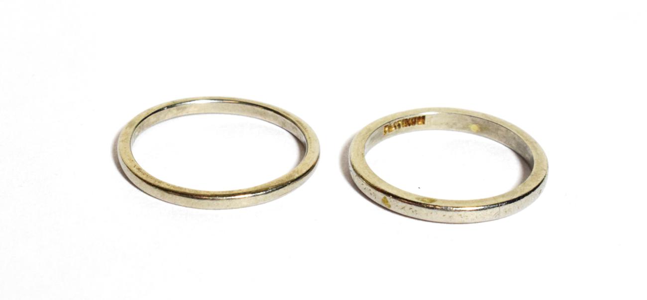 Lot 105 - Two band rings stamped 'PLATINUM', finger sizes M and O (2)