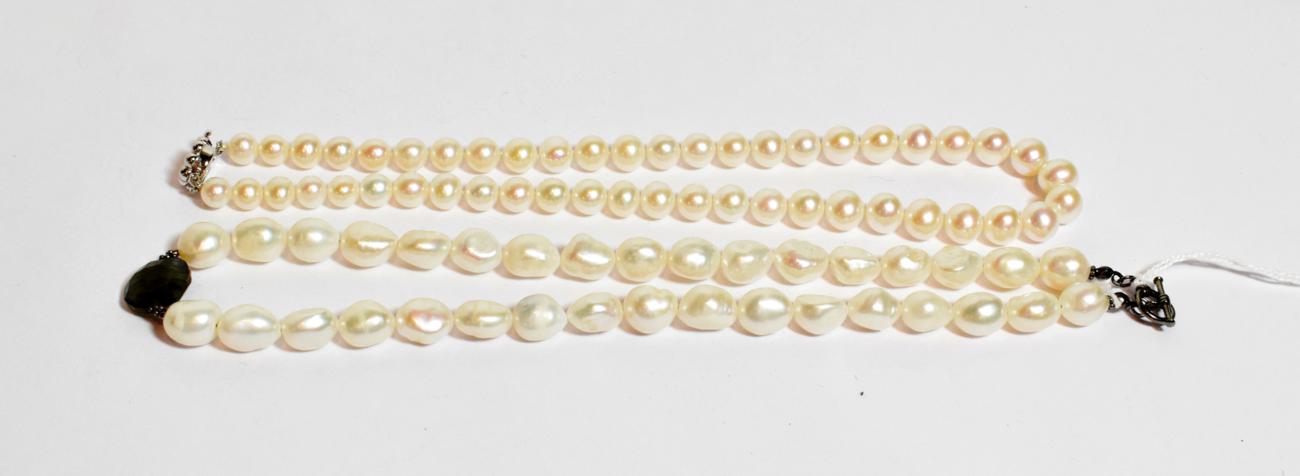 Lot 107 - A cultured pearl necklace with a central labradorite stone, length 46cm; and another cultured pearl