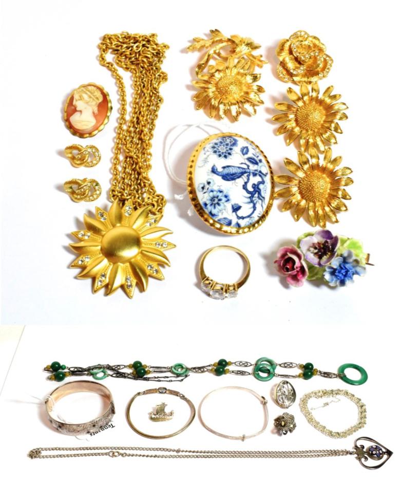 Lot 124 - Assorted costume jewellery including three silver bangles; three silver brooches; a Christian...