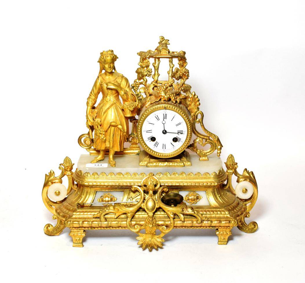 Lot 144 - A French ormolu mounted mantle clock, with pendulum