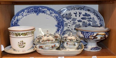 Lot 147 - A shelf of ceramics including Ironstone tureens, blue and white meat plates, Minton cache pot etc
