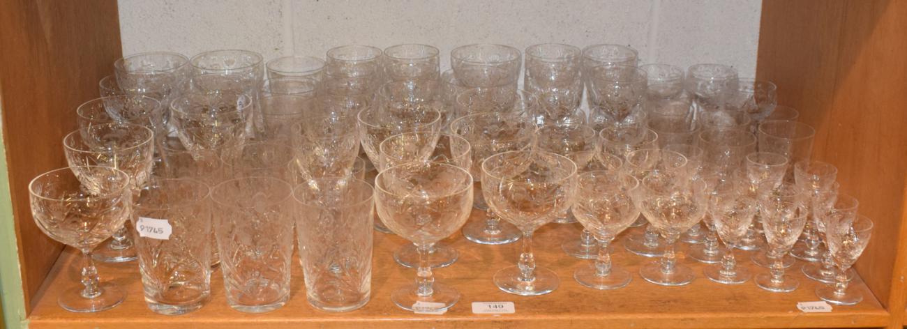 Lot 149 - A service of drinking glasses engraved with flowers, seventy pieces