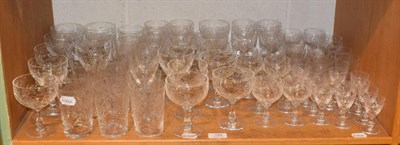 Lot 149 - A service of drinking glasses engraved with flowers, seventy pieces