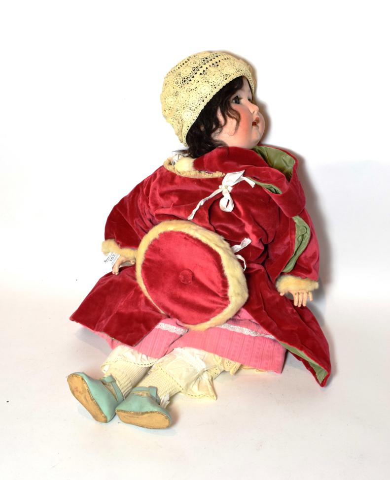 Lot 163 - A large Heubach Koppelsdorf doll, in red velvet fur trimmed coat and hat, neck stamped Heubach...