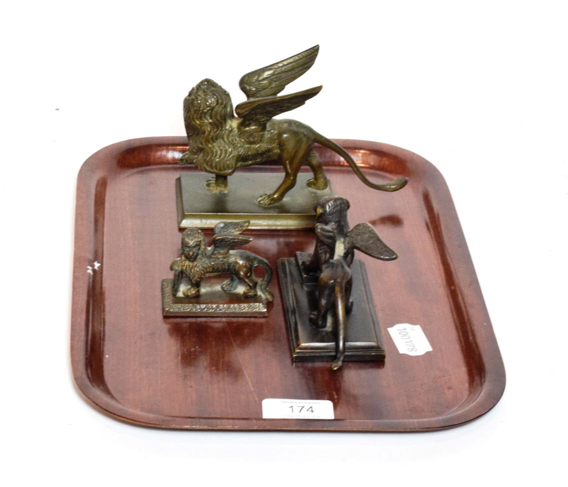 Lot 174 - Three bronze models of the lion of St Marks