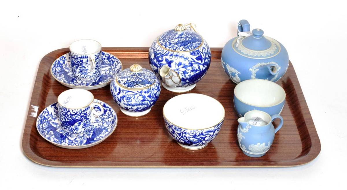 Lot 181 - A Wedgwood Jasperware three piece teaset, 19th century, blue ground; with a coffee set