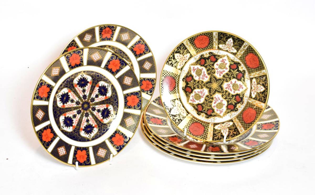 Lot 185 - Four Royal Crown Derby Imari dinner plates, with two smaller and a similar example (7)