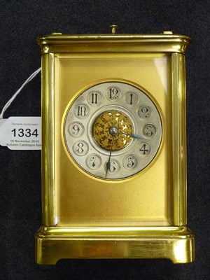 Lot 1334 - A Gilt Brass Striking and Repeating Carriage Clock, circa 1890, the case with carrying handle...