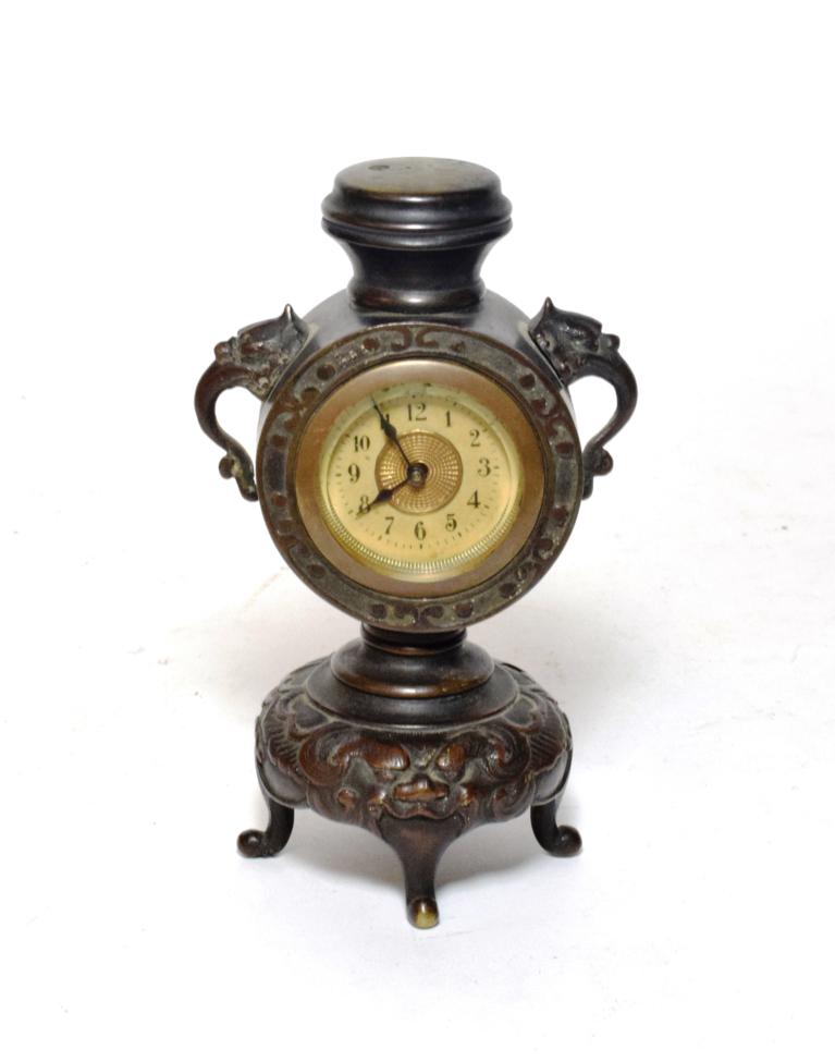 Lot 210 - Late 19th century bronzed small mantel clock