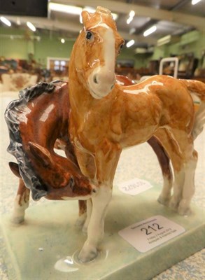 Lot 212 - Royal Worcester 'Foals' by Doris Lindner