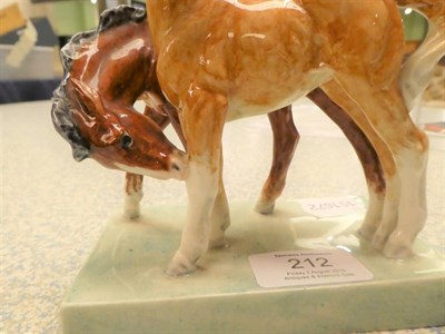 Lot 212 - Royal Worcester 'Foals' by Doris Lindner