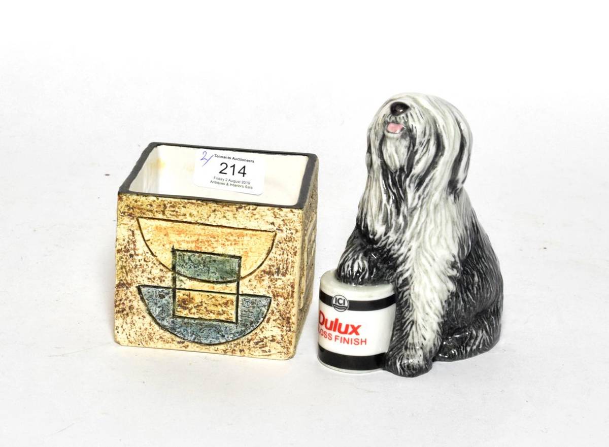Lot 214 - A Royal Doulton Dulux dog and a Troika square vase