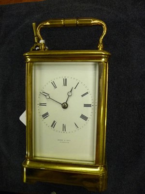 Lot 1335 - A Gilt Brass Striking Carriage Clock, signed Drocourt, retailed by Bright & Sons, Scarborough,...