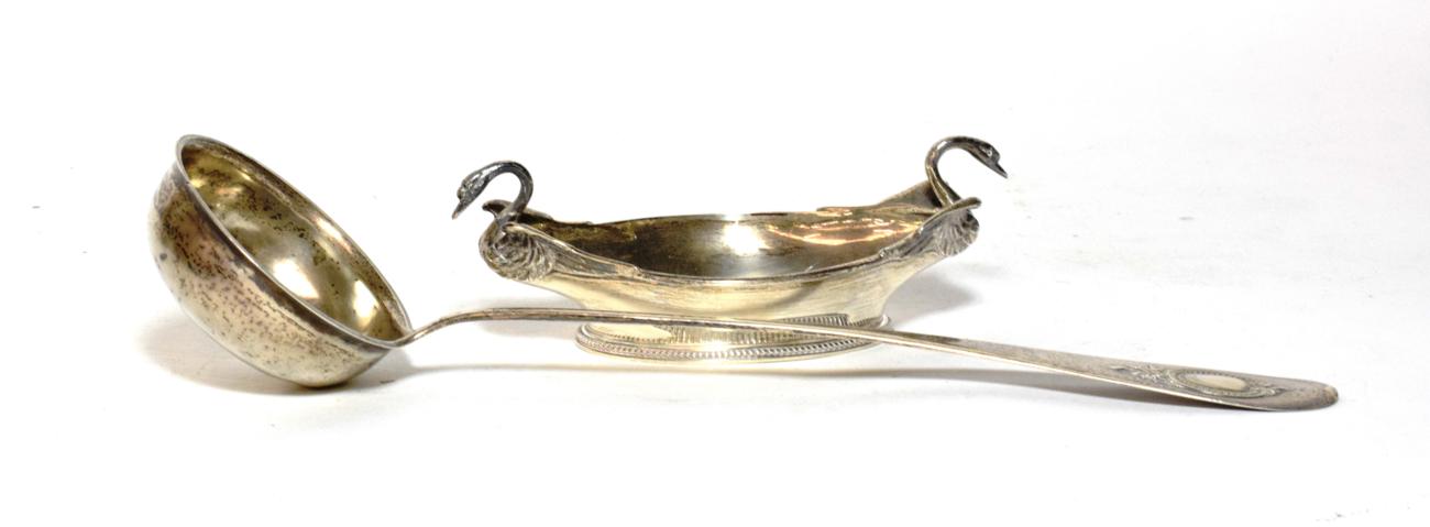 Lot 221 - A George V silver dish, by Elkington & Co. Birmingham, 1928 of bateau form with twin swan...