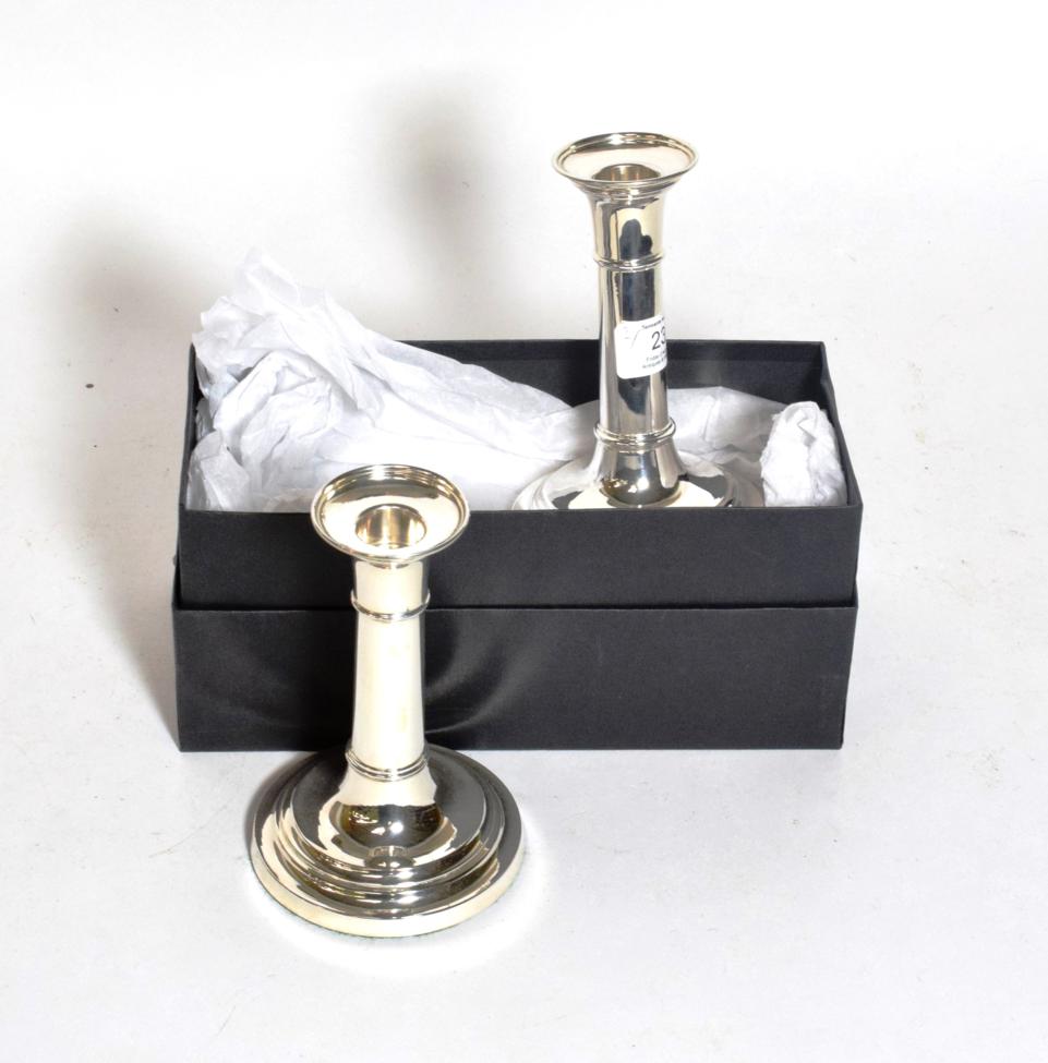 Lot 233 - A pair of Elizabeth II silver candlesticks, London, 2009, each on stepped circular base, in...