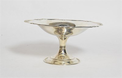 Lot 240 - A George V Silver Bowl, by Henry Atkin, Sheffield, 1910, the shaped bowl with shell heightened...