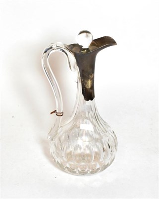 Lot 244 - An Edward VII silver-mounted cut-glass claret-jug, the silver mounts by Hukin and Heath,...