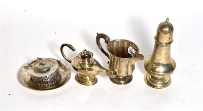 Lot 262 - A group of silver comprising: a caster, Birmingham, 1909, a cream-jug, London, 1839; a...