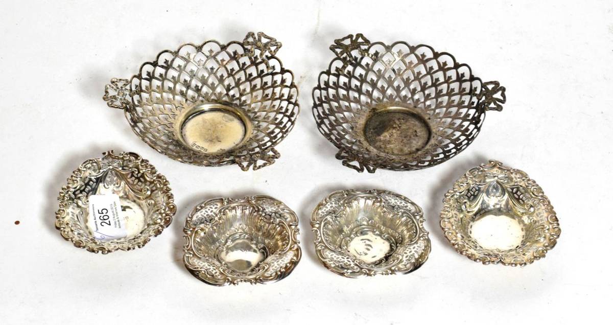 Lot 265 - A pair of pierced silver dishes with three ribbon-tie handles, by Nathan and Hayes, Chester,...