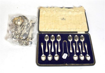Lot 266 - Assorted spoons and flatwares including cased set of twelve teaspoons and a pair of sugar-tongs, by