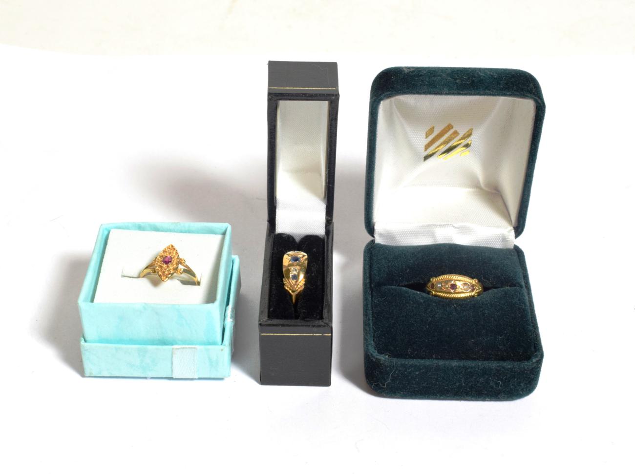 Lot 269 - Two 18 carat gold gem set rings, both finger size H; and a gem set ring stamped 750, finger...