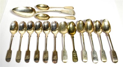 Lot 283 - A group of Fiddle pattern flatware, comprising: a table-spoon, London, 1813; a set of silver...