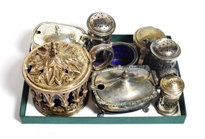 Lot 290 - A group of silver condiment items, comprising: a Victorian Gothic style mustard-pot, Sheffield,...