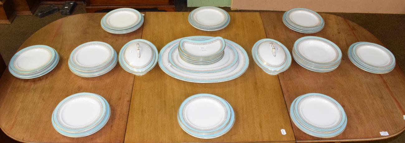 Lot 322 - A Royal Worcester China Works part dinner service decorated with gilt and turquoise borders