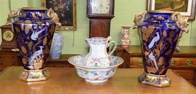 Lot 329 - A pair of 19th century blue ground vases with gilt handles, 45.5cm high; and a Masons jug and bowl