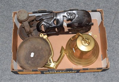 Lot 1009 - A brass ship's bell; a brass anchor; a Salter family scale and a carved African mask (4)